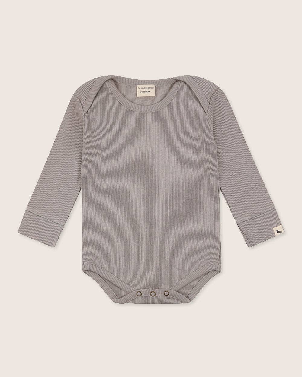 Gray baby rib bodysuit on a beige background
