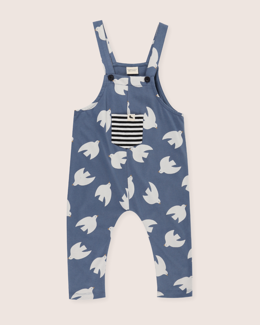 Blue dungaree with white bird pattern on a white background
