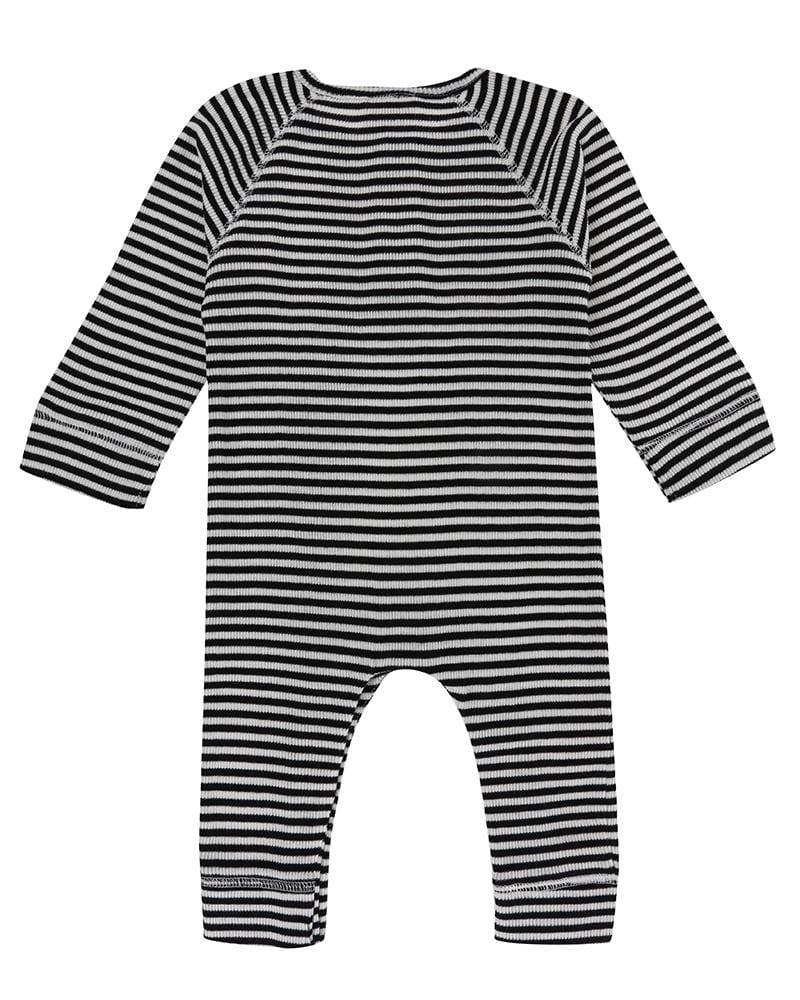 Black and white striped baby playsuit on a white background