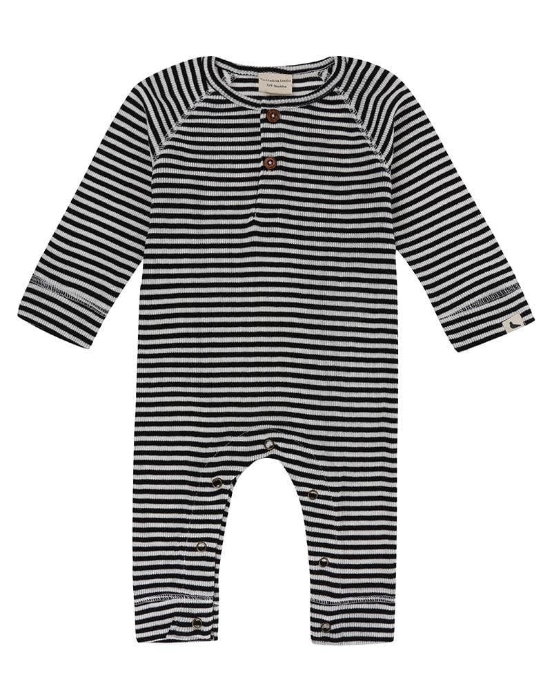 Black and white striped baby playsuit on a white background