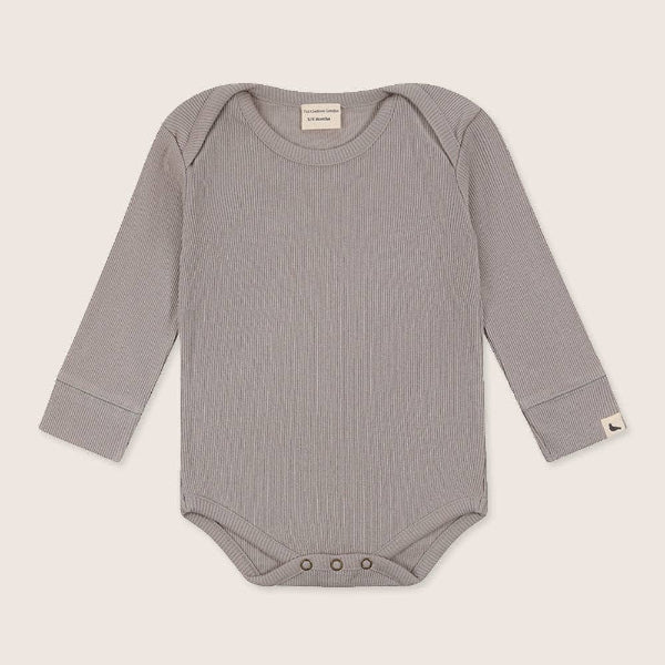 Gray baby rib bodysuit on a beige background