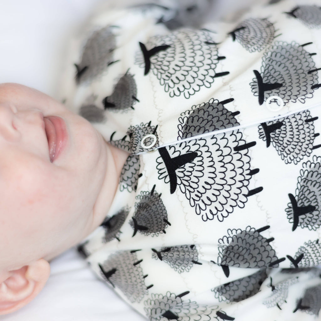 Close look up of detailed baby sleepsuit front