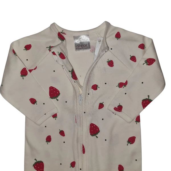 White cotton babygrow with all-over red strawberry pattern on a white background