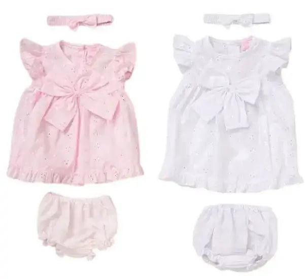 Two baby girl cotton dress sets, one in pink and one in white, each with a matching bow headband and bloomers