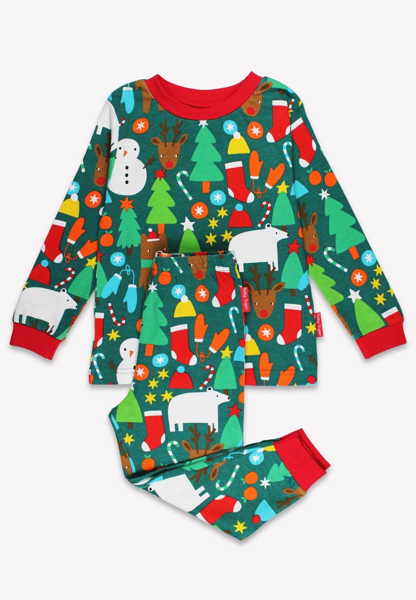 Children's Christmas-themed pajama set with various winter elements on a green background.