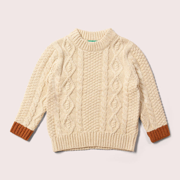 Beige cable knit sweater with brown cuffs on a light gray background