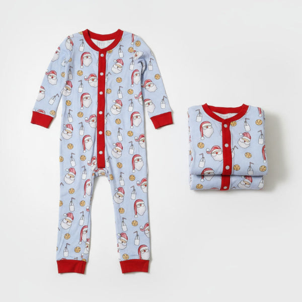 Children's pajama set with Santa Claus pattern on a white background